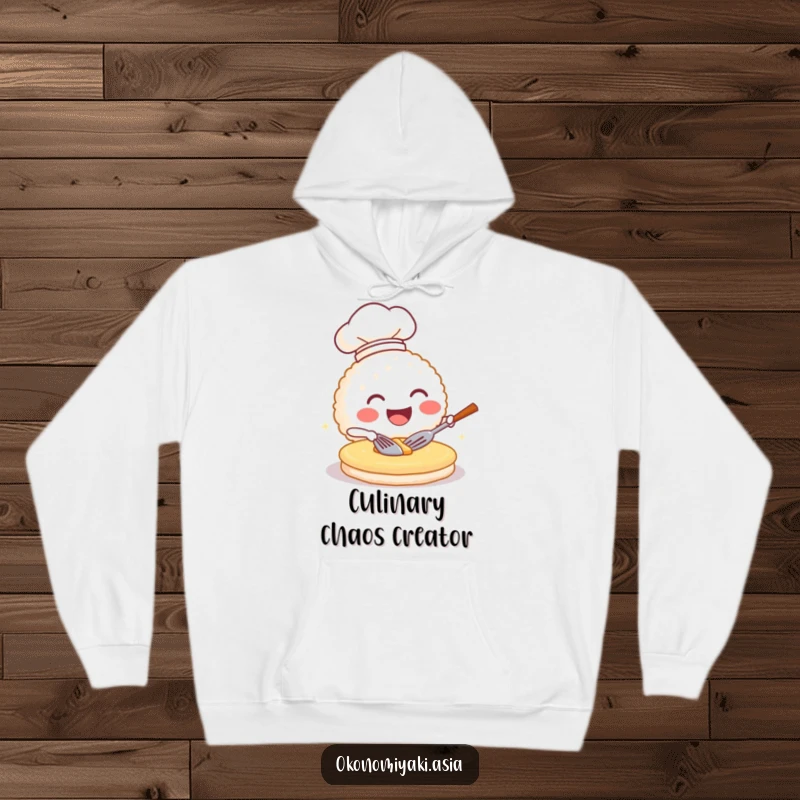 Funny hoodie depicting a smiling rice ball chef flipping a pancake, perfect for cozy humor and warmth.