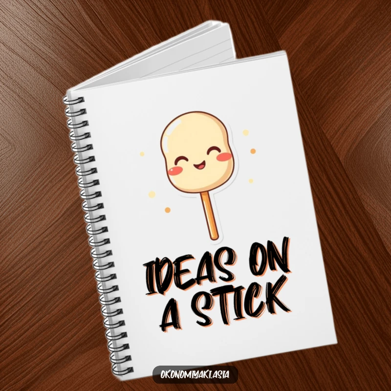 Funny notebook showcasing a delighted dango skewer wiggling joyfully, ideal for note-taking with a smile.